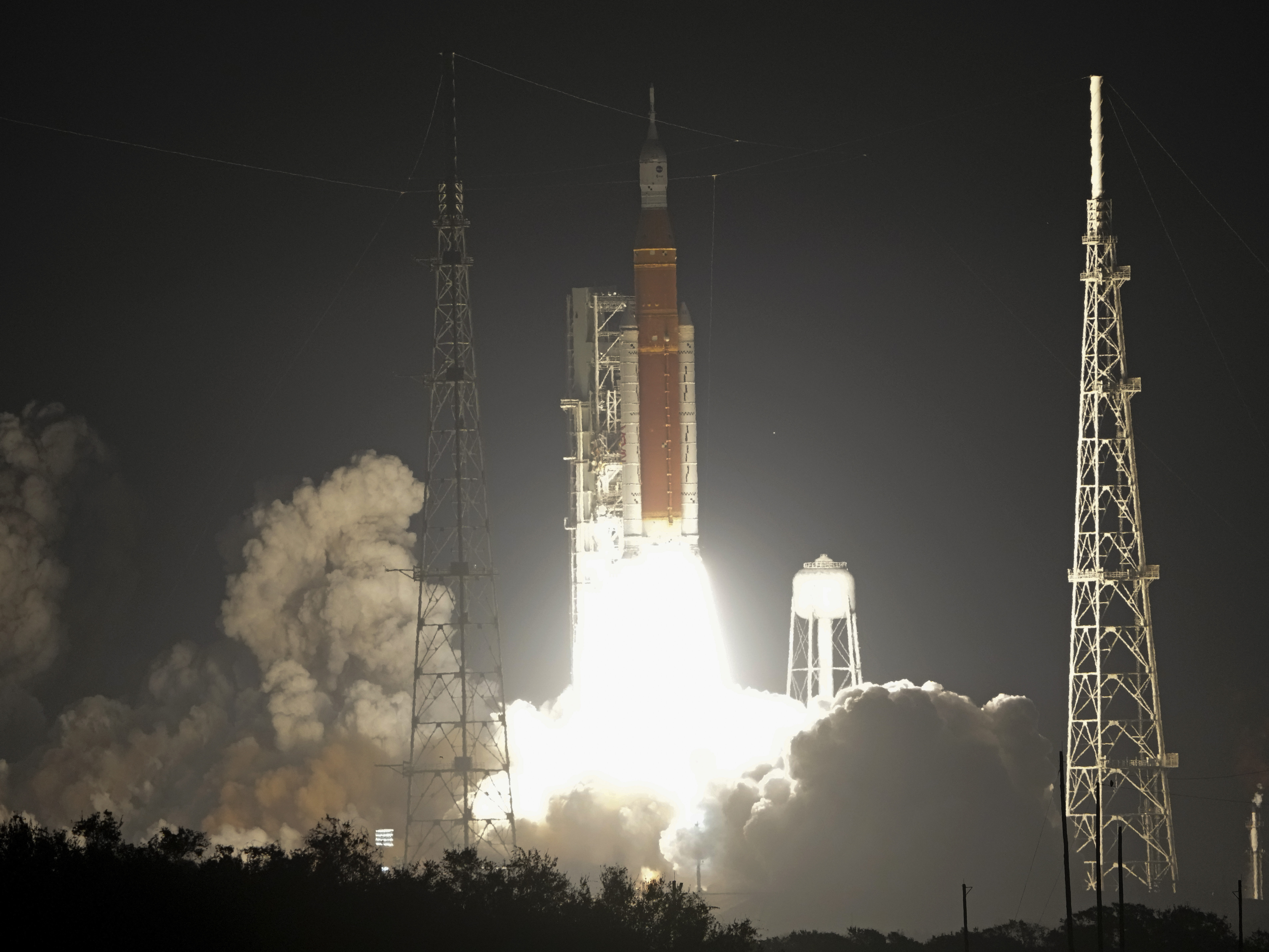 caption: NASA's new moon rocket lifts off from Launch Pad 39B at the Kennedy Space Center in Cape Canaveral, Fla., Wednesday, Nov. 16, 2022. This launch is the first flight test of the Artemis program.