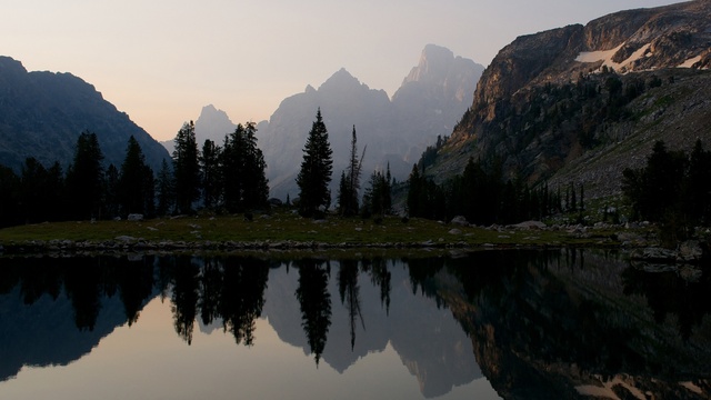 caption: New research from the U.S. Geological Survey shows some fish in the West's pristine, alpine lakes like Lake Solitude in Grand Teton National Park (pictured here) have high mercury levels.