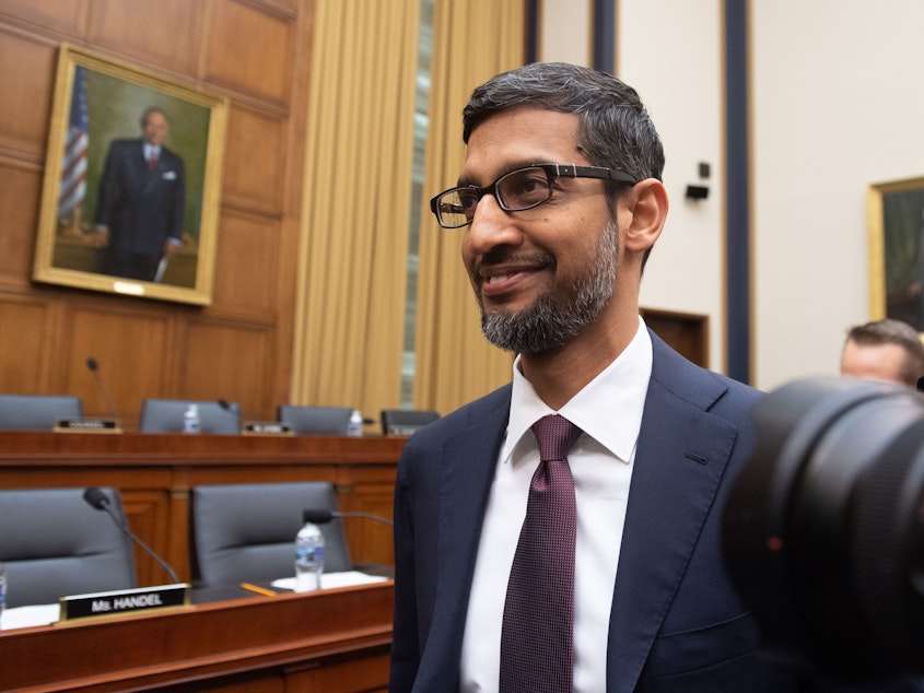 caption: Google CEO Sundar Pichai arrives to testify during a House Judiciary Committee hearing on Capitol Hill on Tuesday.