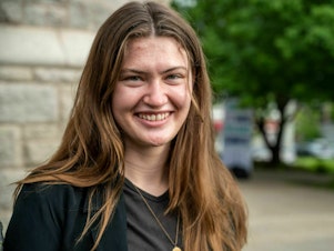 caption: Rikki Held, 22, arrives for the United States' first youth climate-change trial at Montana's 1st Judicial District Court in Helena, Mont., on June 12. She was one of 16 young plaintiffs, ages 5 to 22, who sued the state for promoting fossil fuel energy policies that they say violate their constitutional right to a "clean and healthful environment."