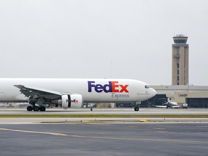 caption: A FedEx Boeing 767 cargo plane similar to this one, seen here in Fort Lauderdale, Fla., almost collided with a Southwest jet at the international airport in Austin, Texas, last year. Safety investigators say an air traffic controller's mistake was to blame and that critical safety technology might have prevented the incident.
