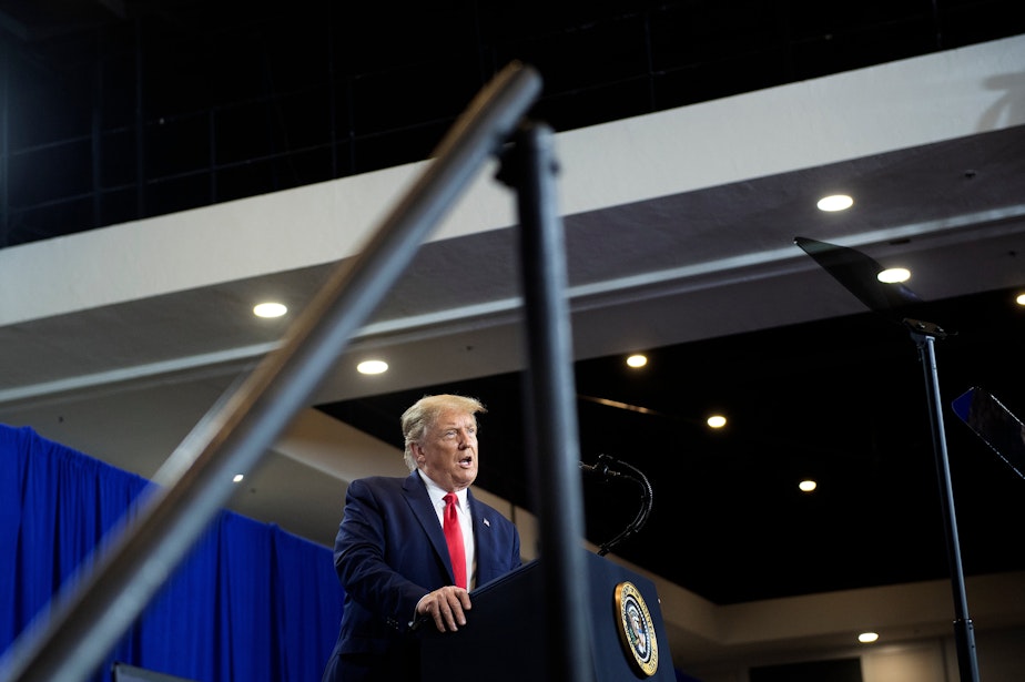 caption: President Trump announced a partnership with two national pharmacy chains to administer coronavirus vaccines to nursing homes at an event in Fort Myers, Fla.