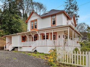 caption: In this undated photo provided by RETO Media is the house featured in the Steven Spielberg film <em>The Goonies</em> in Astoria, Ore.