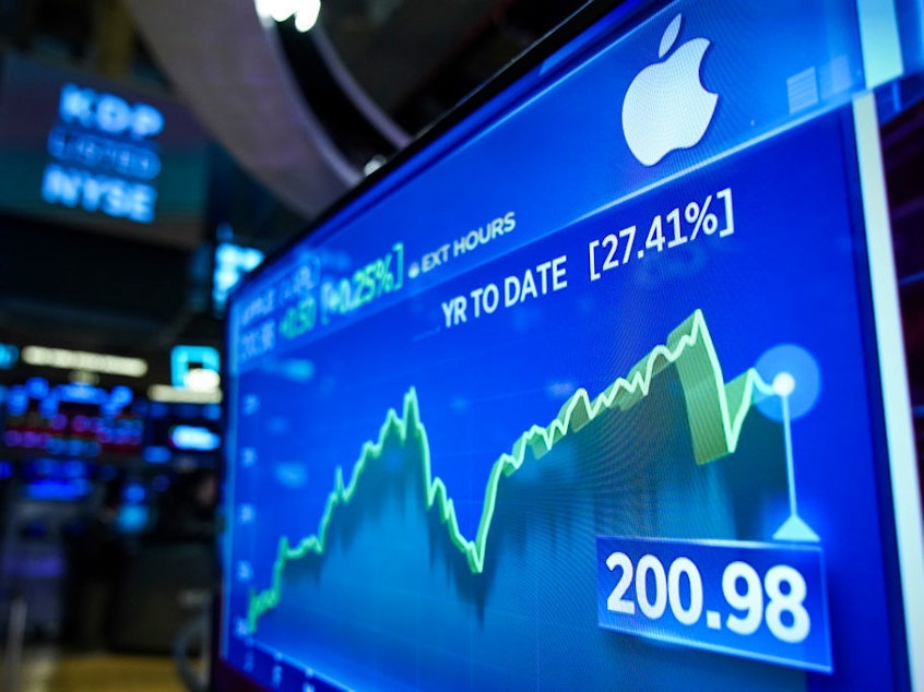 Stock numbers for Apple are displayed on a monitor on the floor of the New York Stock Exchange (NYSE) at the opening bell on August 13, 2019 in New York City.