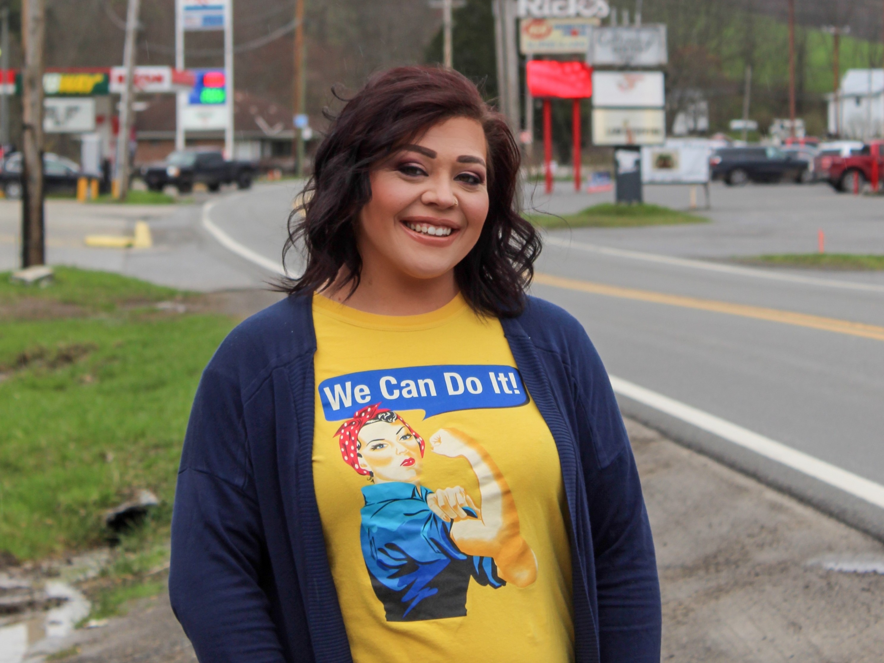 caption: Courtney Meadows says the coronavirus has changed how other people see her job as a grocery store cashier.