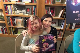 caption: Debi and Avery Jackson at the book launch party in Seattle for Avery's book, 'It's Okay to Sparkle.'