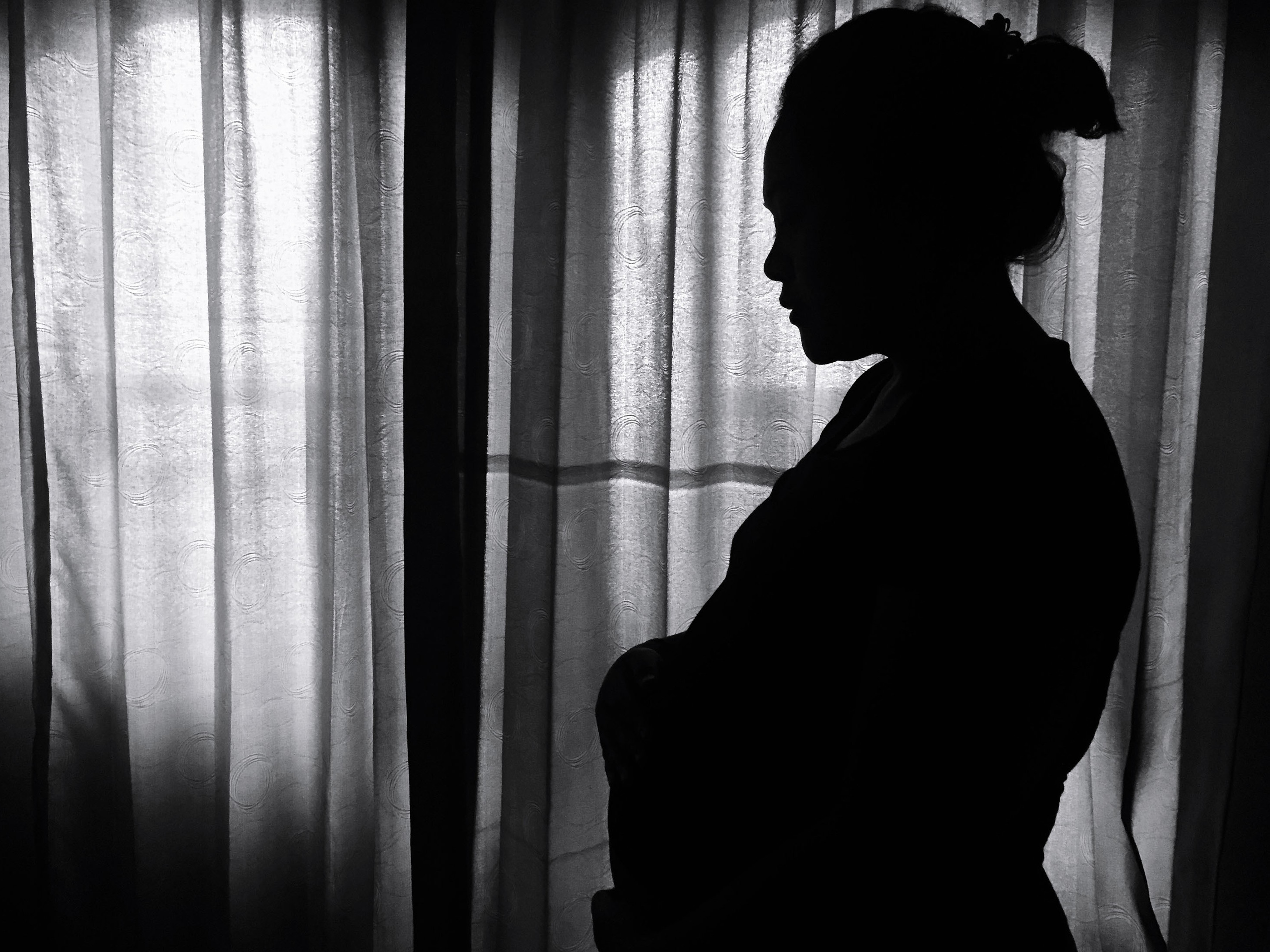 caption: Unwed pregnant women in China face a legal gray zone where they are unable to access public services for themselves and their children.