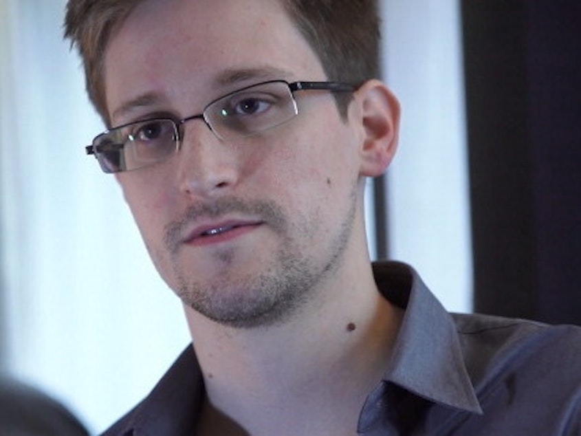 caption: Edward Snowden, seen here in Hong Kong in 2013, is seeking dual Russian-U.S. citizenship. The former contractor for the U.S. National Security Agency revealed details of top-secret surveillance conducted by the NSA.