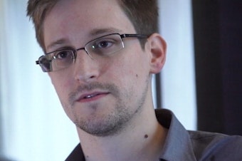 caption: Edward Snowden, seen here in Hong Kong in 2013, is seeking dual Russian-U.S. citizenship. The former contractor for the U.S. National Security Agency revealed details of top-secret surveillance conducted by the NSA.