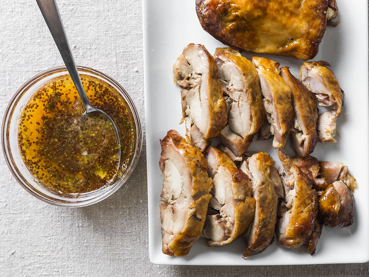 caption: Turkey Thigh Confit is a delicious main course that you can make well ahead of Thanksgiving.