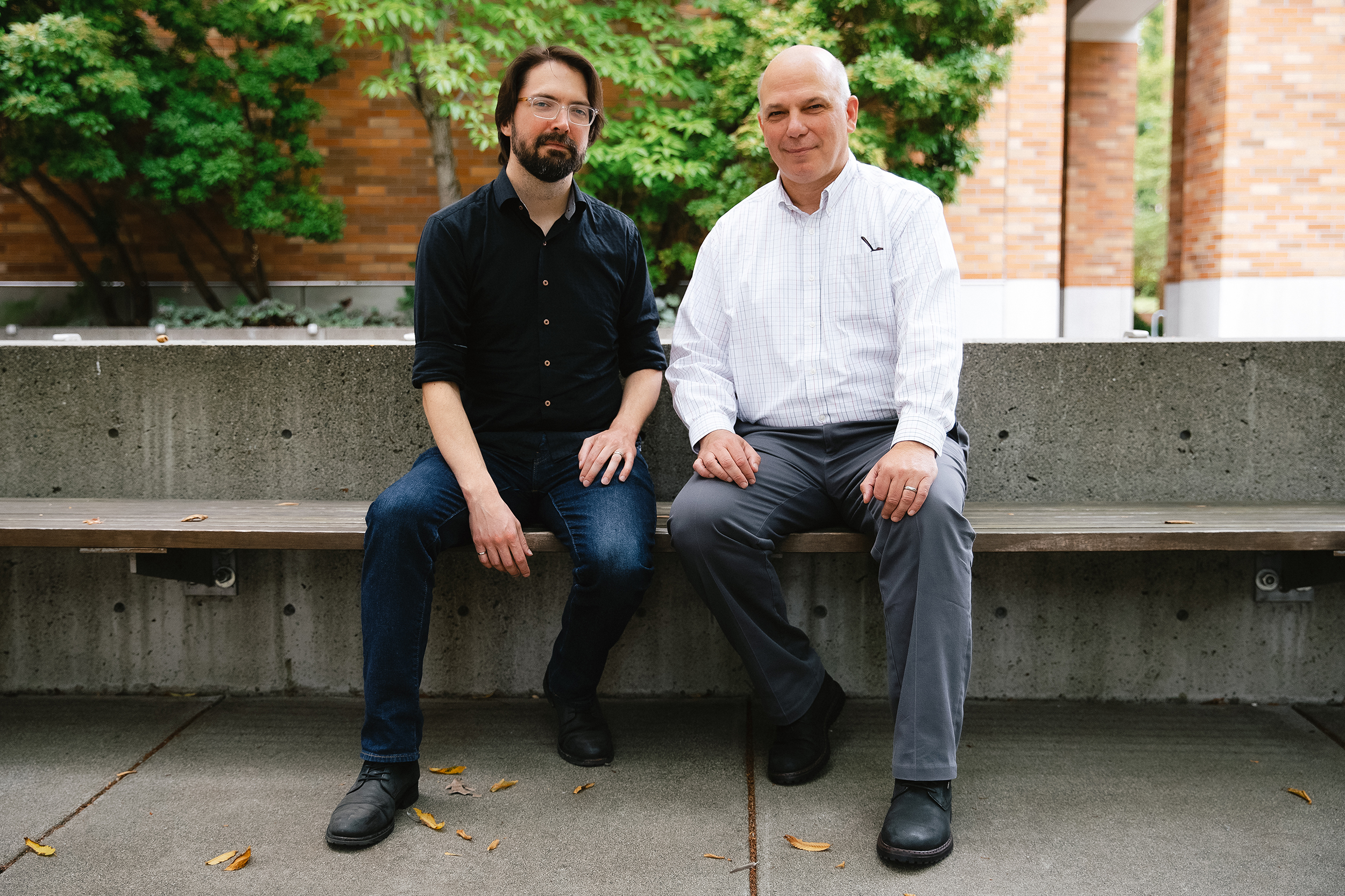 caption: Dr. Jeffrey Herron, left, an associate professor of neurological surgery at the University of Washington School of Medicine, and Dr. Jeffrey Ojemann, right, vice chair for discovery and professor of neurological surgery at the University of Washington School of Medicine, are portrayed on Tuesday, August 19, 2025, on the University of Washington campus in Seattle.