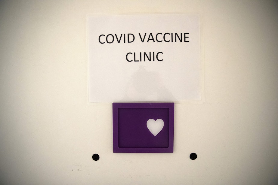 caption: A sign for the Covid Vaccine Clinic for employees is shown on Wednesday, December 23, 2020, at Evergreen Health Medical Center in Kirkland. 