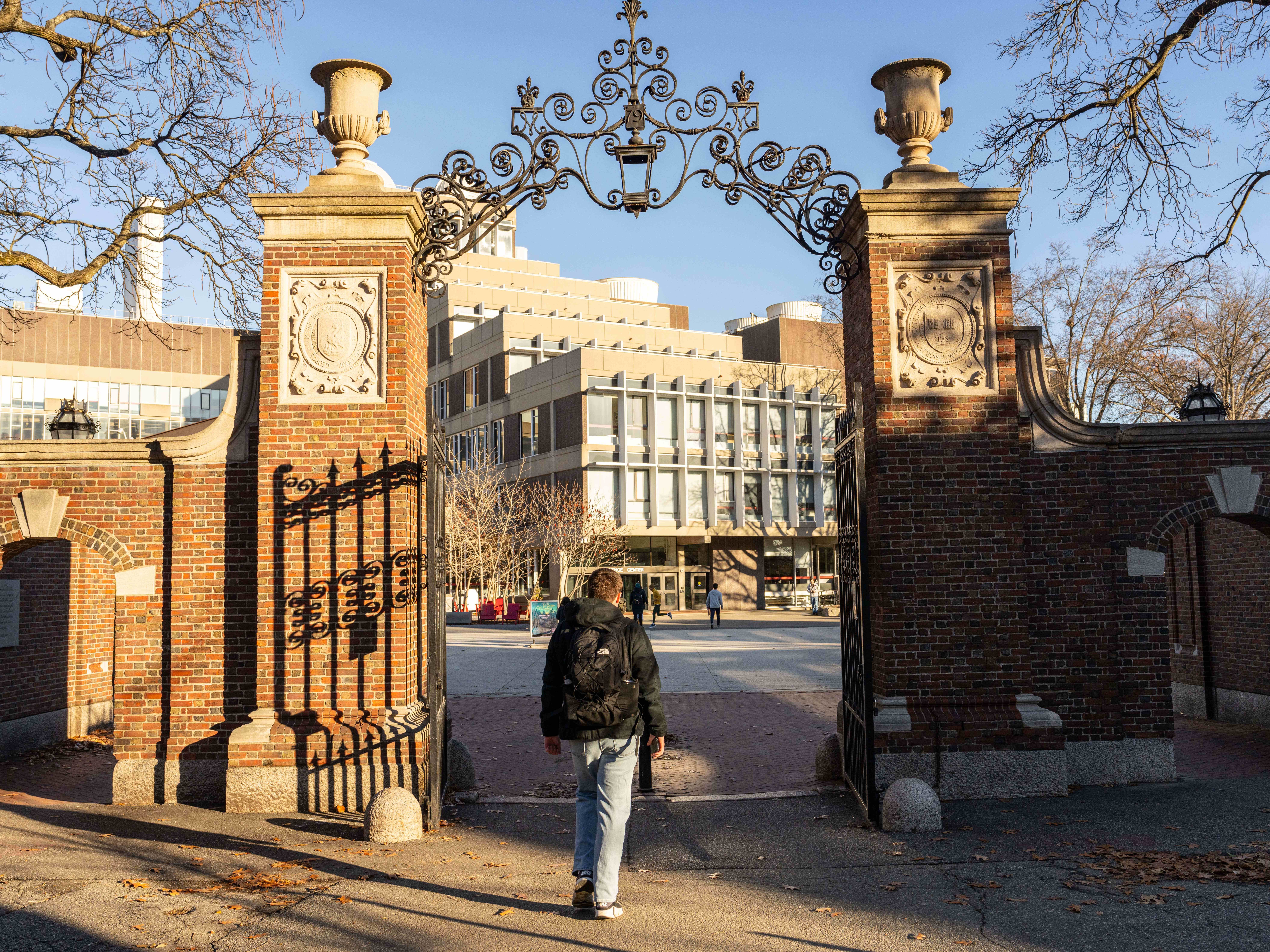 caption: Harvard University is one of more than a dozen institutions of higher learning nationwide that recently announced a hiring freeze, citing uncertainties around federal funding.
