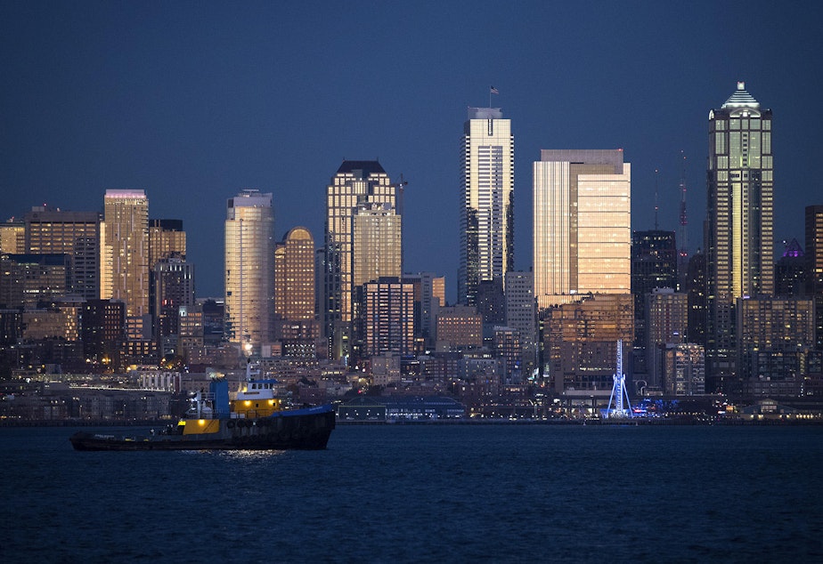 The sun sets on downtown Seattle on Friday, October 27, 2017, shown from Harbor Ave. Southwest.