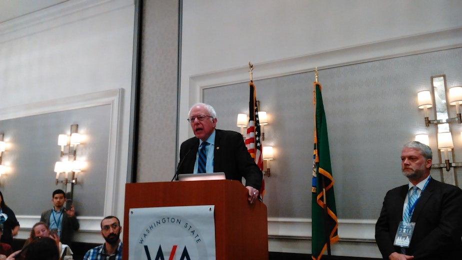 caption: Bernie Sanders addresses the Washington state delegates at breakfast Wednesday morning.