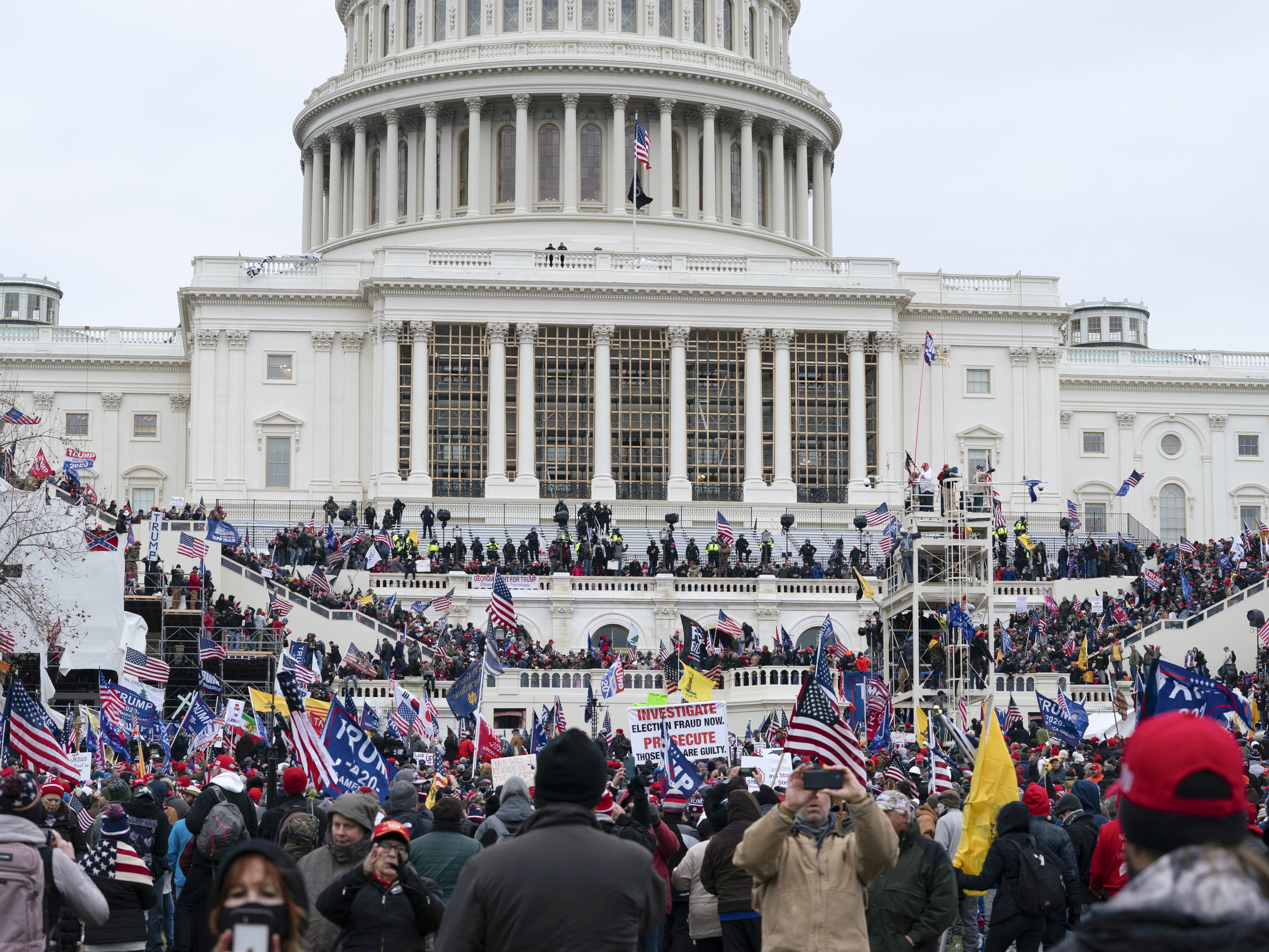 caption: Researchers have used crowdsourcing to scrutinize video and photos from the riot at the Capitol on Jan. 6, and have identified some of those who took part. The researchers have shared their information with law enforcement.