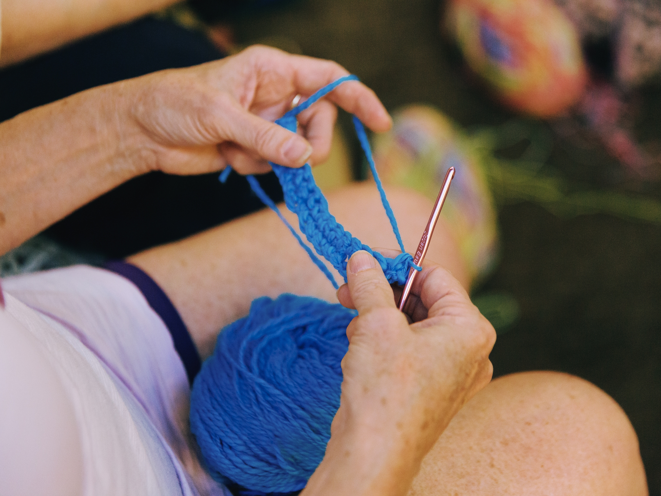 caption: Death educator Gabrielle R. Gatto and artist Mary Pat Klein host "Grieving &amp; Weaving" at The Green-Wood Cemetery on July 23, 2024.