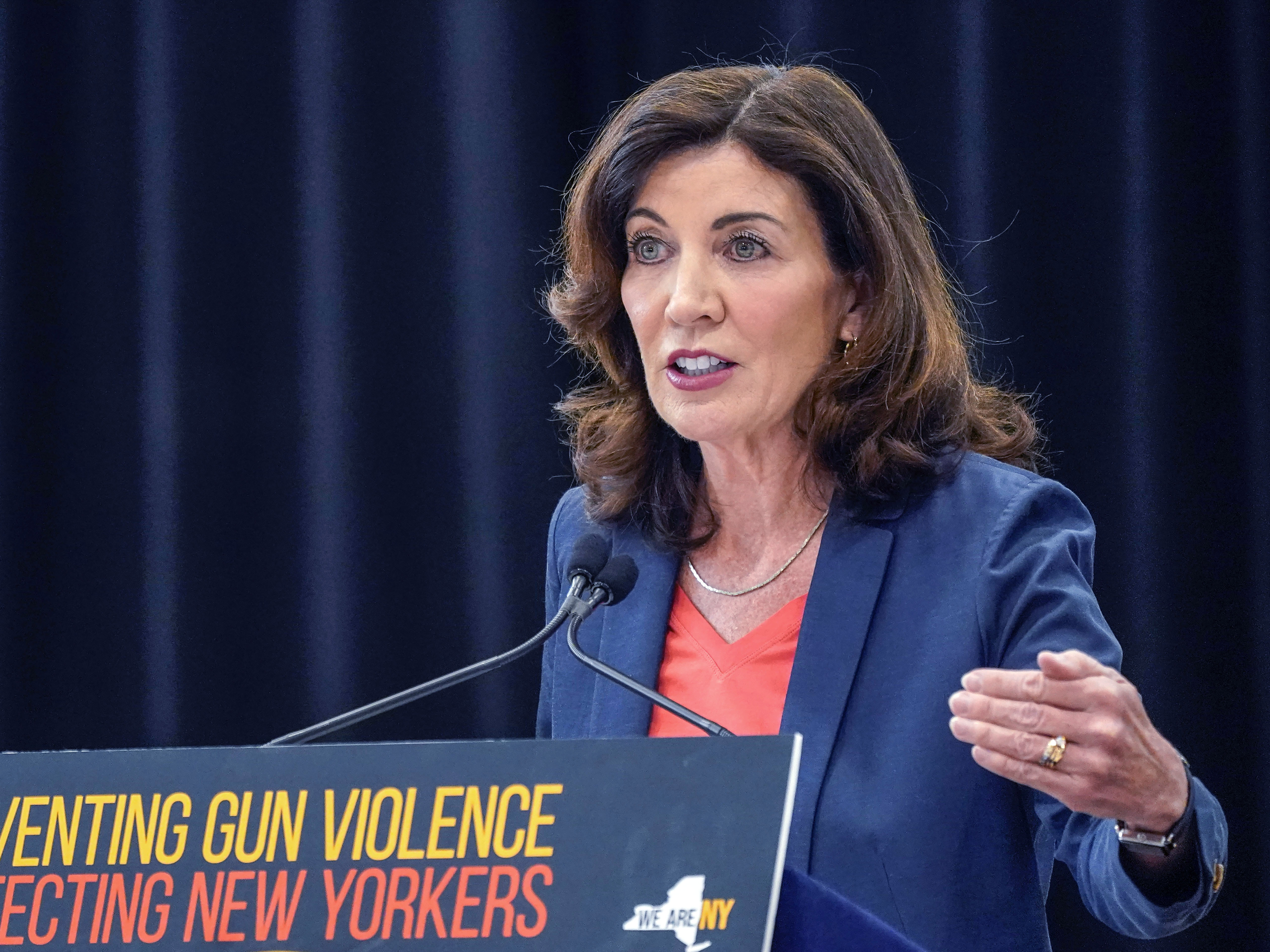 caption: New York Gov. Kathy Hochul speaks during a ceremony to sign a package of bills to strengthen gun laws on June 6, 2022, in New York.