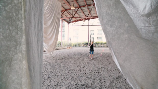caption: <p>Artist Anne Hamilton, installing at Portland's Centennial Mills.</p>