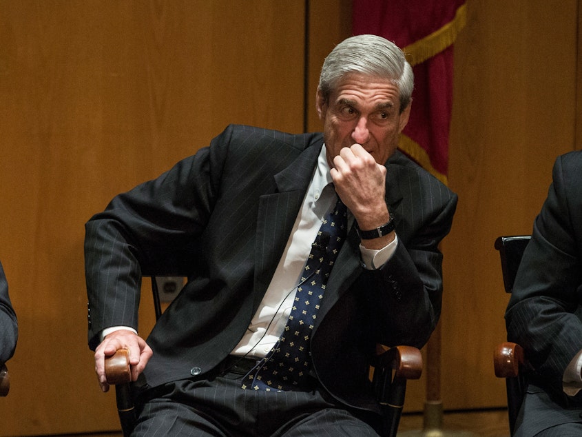 caption: Former FBI Director Robert Mueller III, pictured in 2013 during a forum in in New York.