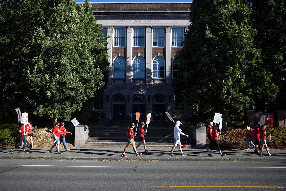 caption: Seattle Public Schools educators picket while on strike on Thursday, September 8, 2022, outside of the Salmon Bay School on Northwest 65th Street in Seattle.