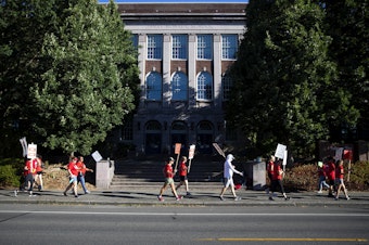 caption: Seattle Public Schools educators picket while on strike on Thursday, September 8, 2022, outside of the Salmon Bay School on Northwest 65th Street in Seattle. 