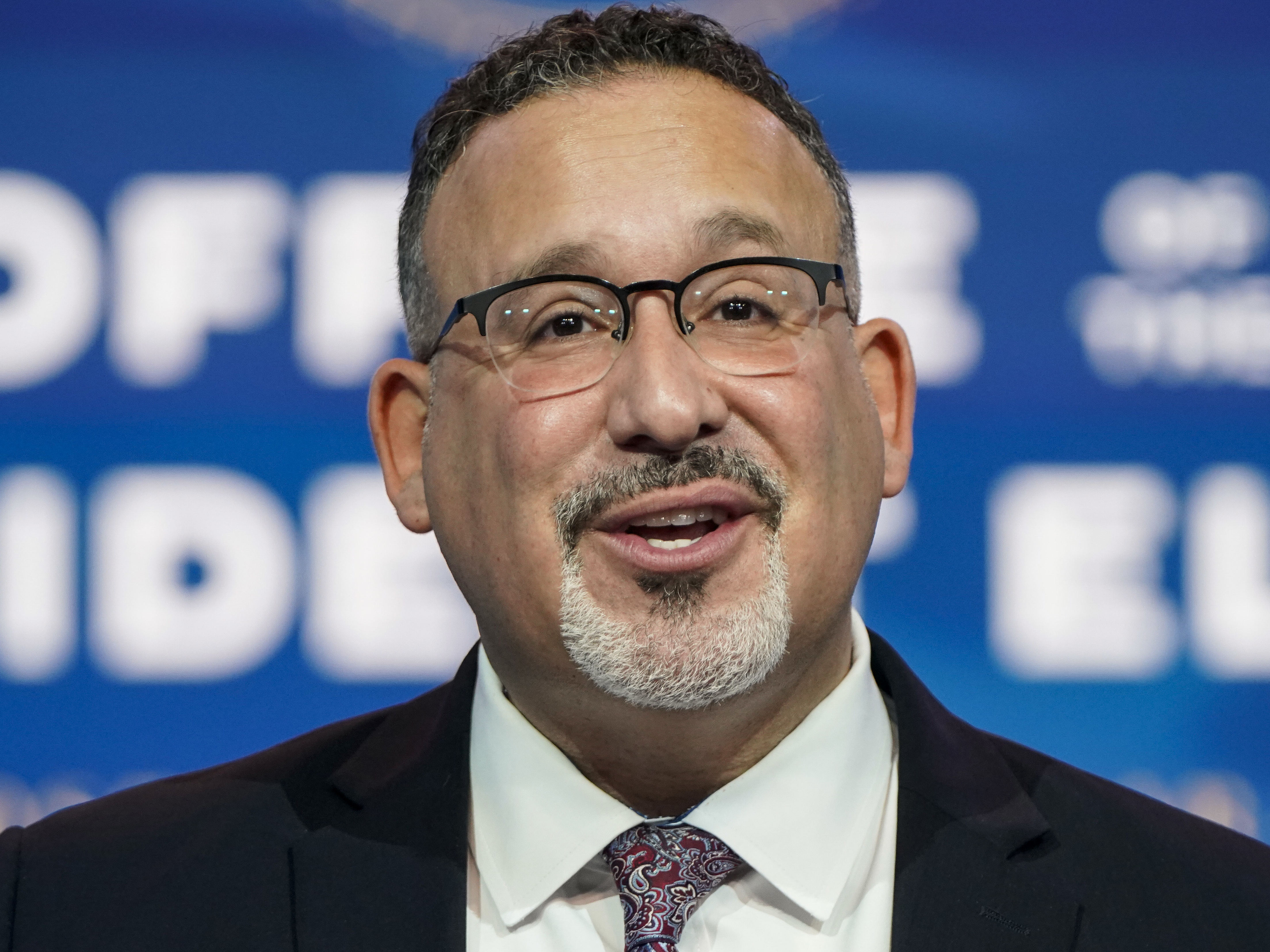 caption: "Borrowers who devote a decade of their lives to public service should be able to rely on the promise of Public Service Loan Forgiveness," U.S. Education Secretary Miguel Cardona said on Wednesday.