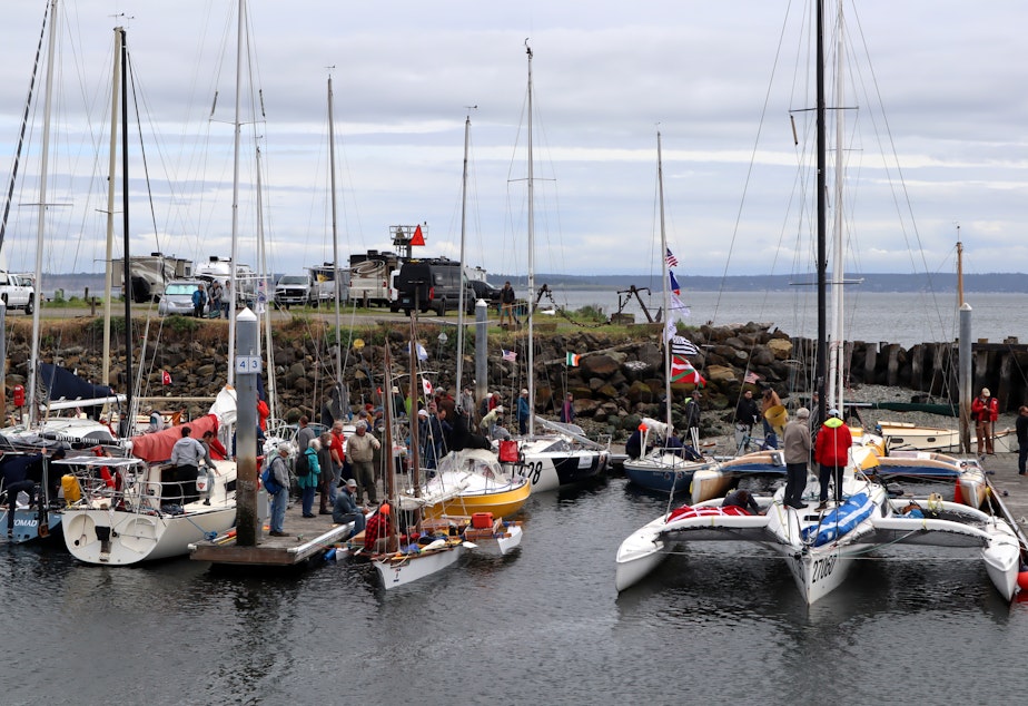 caption: Race to Alaska entrants of many shapes and crew sizes were getting ready for the 750-mile engineless, unsupported boat race from Port Townsend to Ketchikan on June 12, 2022.