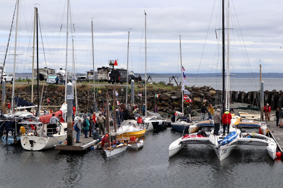 caption: Race to Alaska entrants of many shapes and crew sizes were getting ready for the 750-mile engineless, unsupported boat race from Port Townsend to Ketchikan on June 12, 2022.