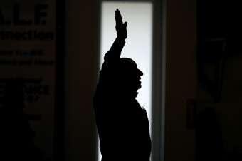 caption: First Church of God Pastor Charles Hundley sings a hymn during the morning service, Sunday, Jan. 7, in Des Moines, Iowa. Former President Donald Trump and his rivals for the GOP nomination have pushed for endorsements from pastors and faith communities. Evangelicals and religious Christian groups are traditionally critical to the Republican Party.