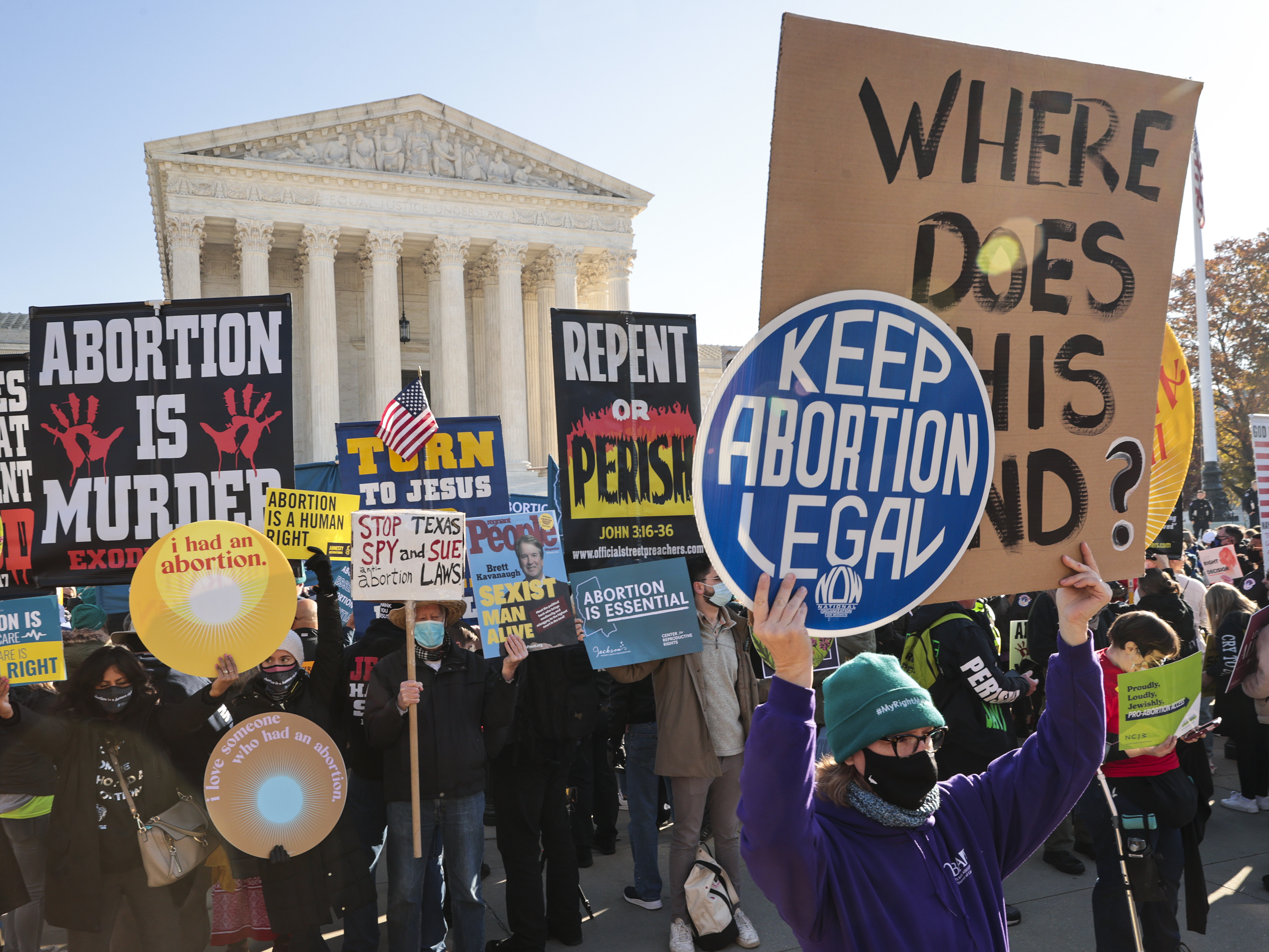 caption: Demonstrators gather in front of the Supreme Court as the justices hear arguments earlier this month in Dobbs v. Jackson Women's Health, a case about a Mississippi law that bans most abortions after 15 weeks.