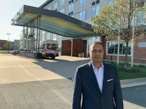 caption: Vinay Patel, head of Fairbrook Hotels, owns 11 hotels around Virginia.