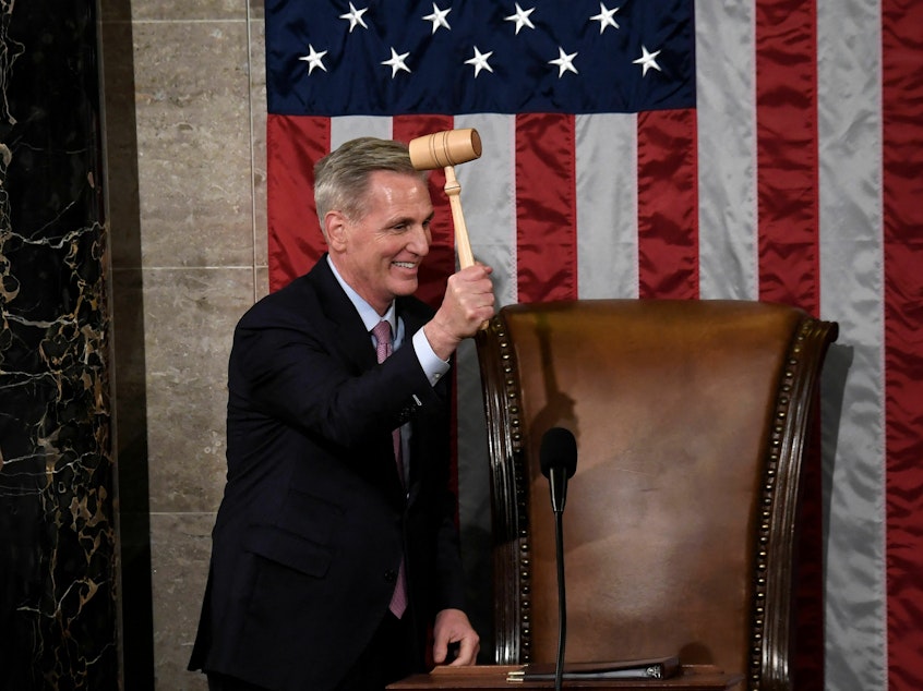 caption: Newly elected speaker of the House of Representatives Kevin McCarthy holds the gavel on Jan. 7, 2023.