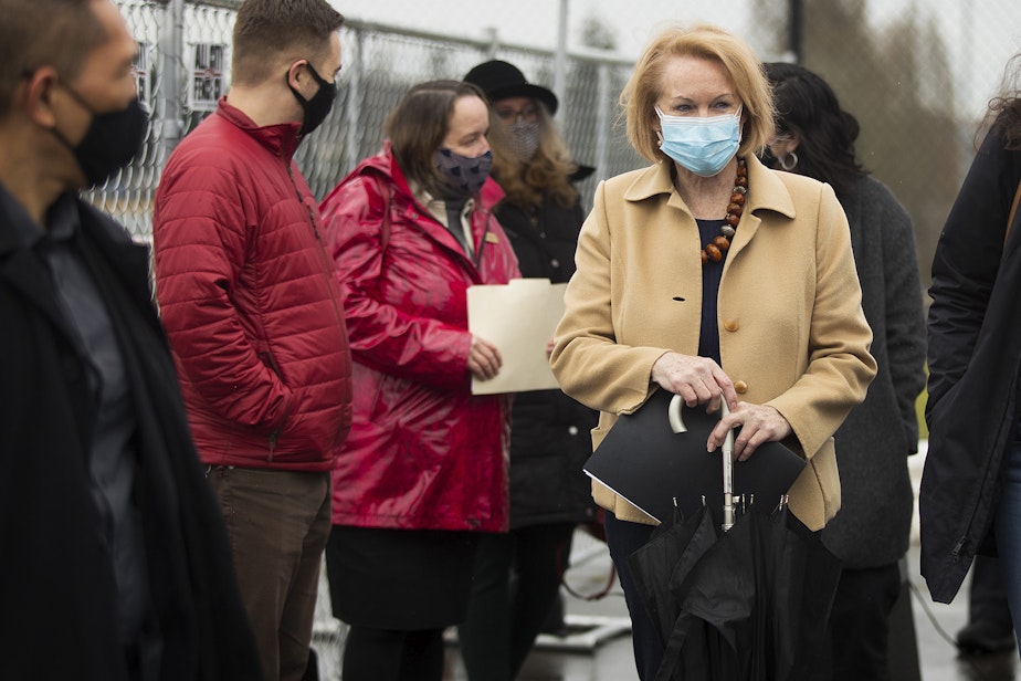 caption: Seattle Mayor Jenny Durkan leaves a press conference on Thursday, February 18, 2021, at the West Seattle Covid-19 testing site on Southwest Thistle Street in Seattle. A pop-up vaccination clinic was set up for older Latino community members who were referred by El Comite or Villa Comunitaria. 