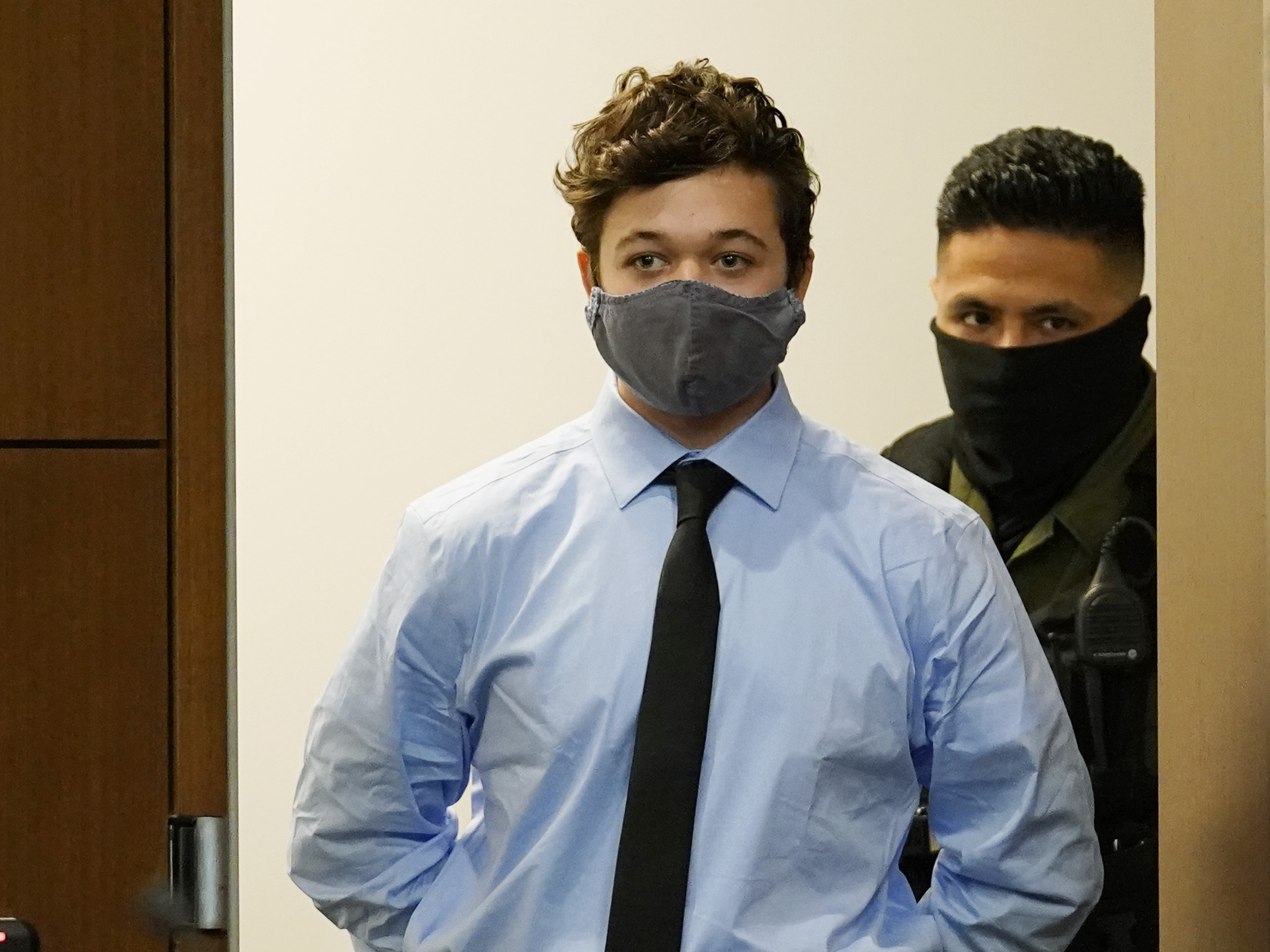caption: Kyle Rittenhouse, pictured in court on on Oct. 30, 2020, is accused of killing two protesters days after Jacob Blake was shot by police in Kenosha, Wis.