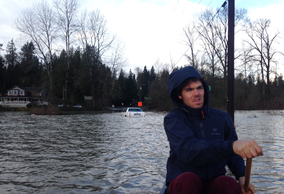 caption: Andrew Ide grapples with flooding on his farm in Snohomish.