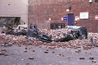 caption: Damage from fallen bricks in Seattle's Pioneer Square district after the 2001 Nisqually Quake.