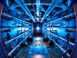 caption: The multi-billion dollar National Ignition Facility has used 192 laser beams to create net energy from a tiny pellet of nuclear fuel.