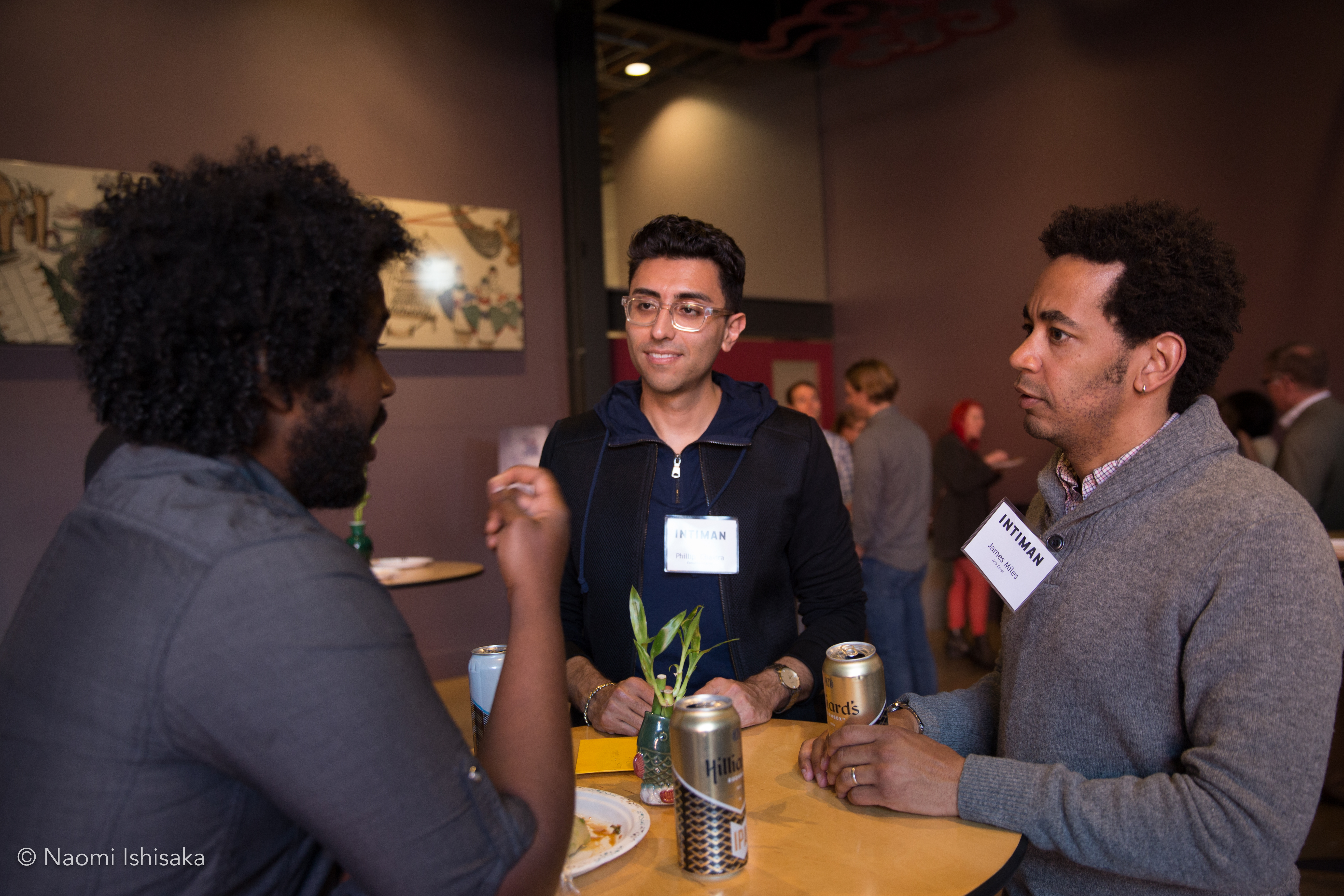 caption: Intiman Theatre's new Executive Director Phillip Chavira, center