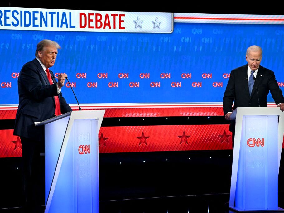 caption: President Biden and former President Donald Trump participate in the first presidential debate of the 2024 elections at CNN's studios in Atlant on June 27.