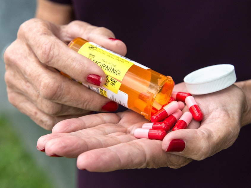 caption: Many seniors take multiple drugs, which can lead to side effects like confusion, lightheadedness, difficulty sleeping and more. Doctors who specialize in the care of the elderly often recommend carefully reducing the medication load.