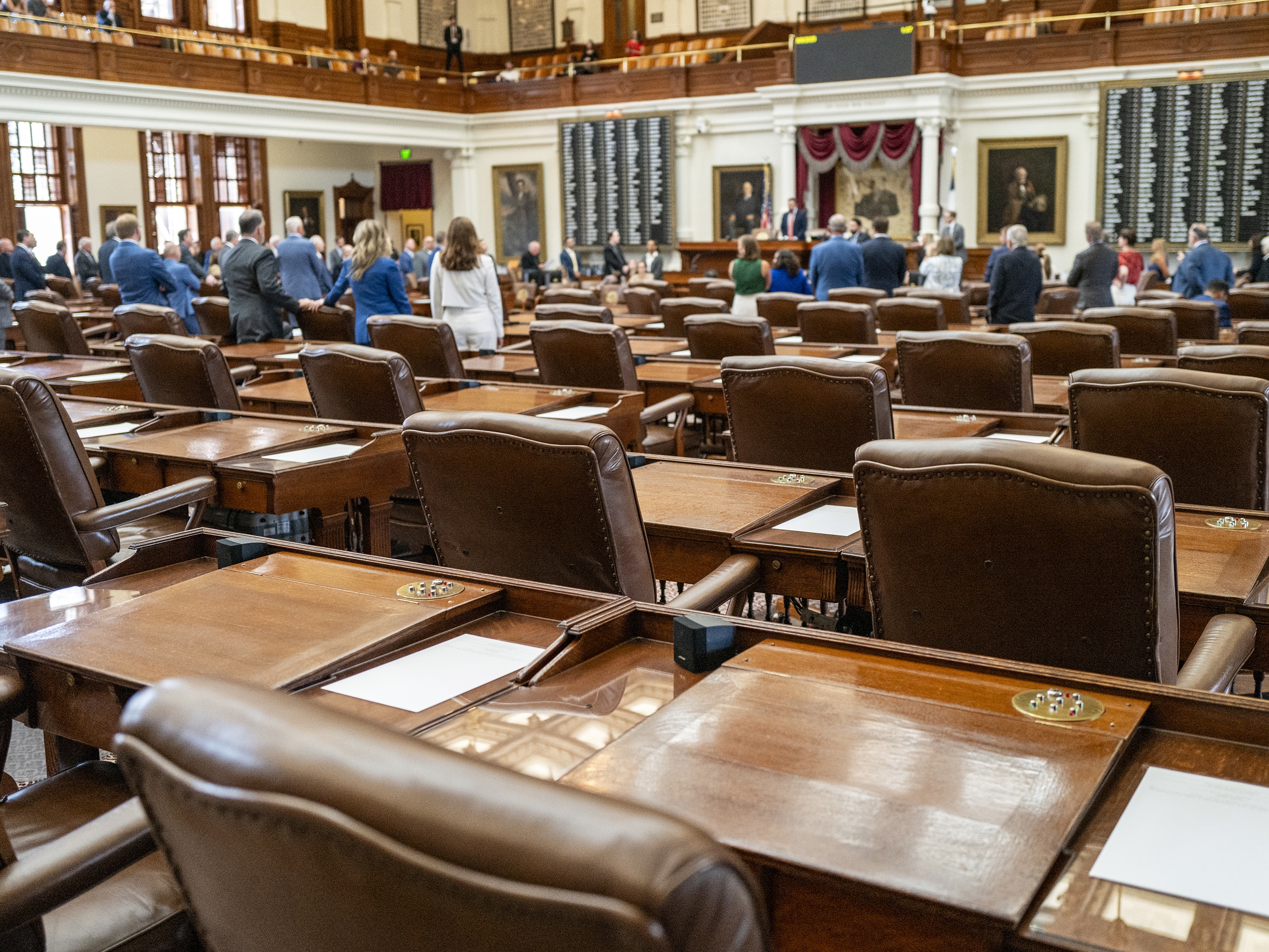 caption: Democrats have been leaving a lot of empty chairs in the Texas House of Representatives. They blocked a quorum needed to allow Republicans to vote on President Trump's request for new maps in next year's Congressional elections.