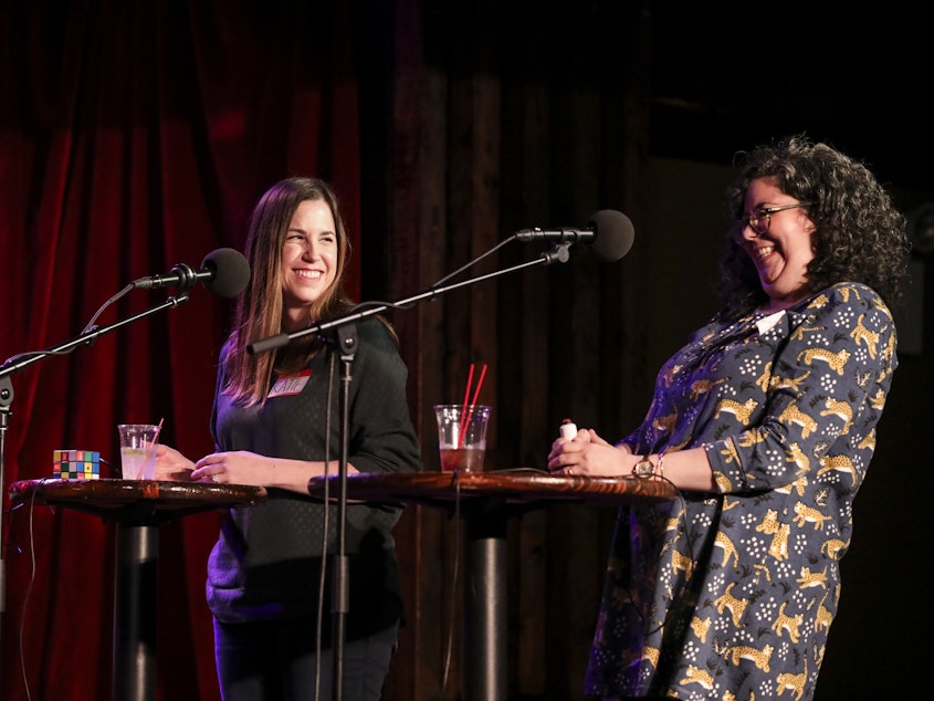 caption: Contestants compete in the final round on <em>Ask Me Another</em> at the Bell House in Brooklyn, New York.