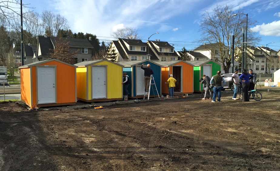 caption: Tiny houses being erected at Othello Village in South Seattle.