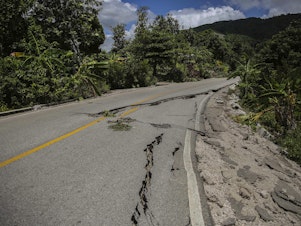 caption: A road is seen damaged by the earthquake in Camp-Perrin, Les Cayes, Haiti, Sunday, Aug. 15, 2021.