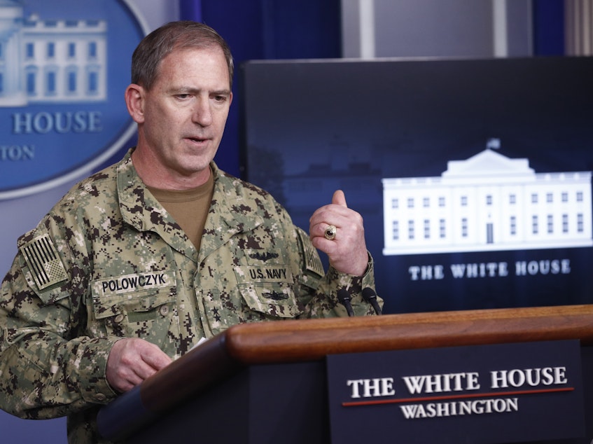 caption: Navy Rear Adm. John Polowczyk, supply chain task force lead at FEMA, speaks during a coronavirus task force briefing at the White House on Sunday.