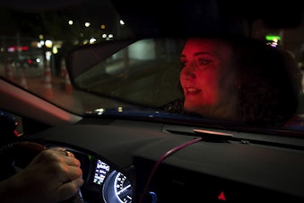 caption: Melinda Miner drives for Uber at 8:36 p.m. on Tuesday, September 10, 2019. She works for Lyft, too. 