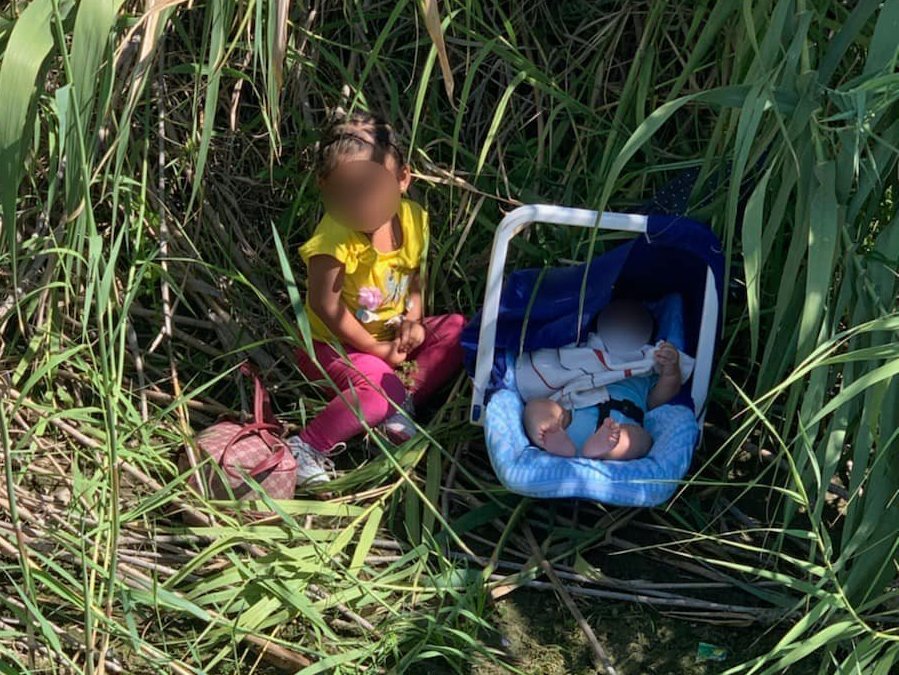 caption: A little girl and her baby brother were taken into custody by U.S. Border Patrol agents this week, after they were discovered abandoned along the U.S.-Mexico border.