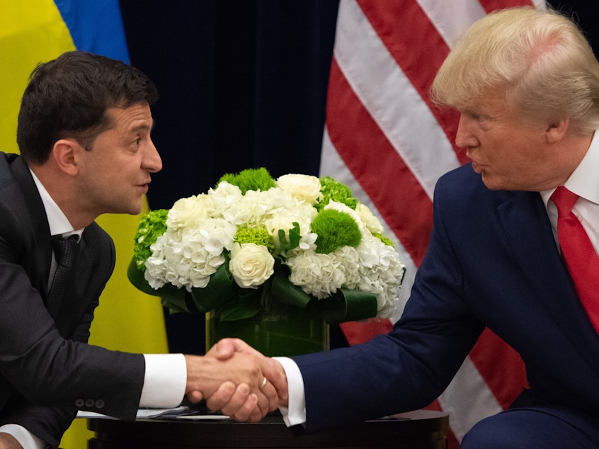 caption: President Trump and Ukrainian President Volodymyr Zelenskiy shake hands during a meeting in New York on Sept. 25, on the sidelines of the United Nations General Assembly.