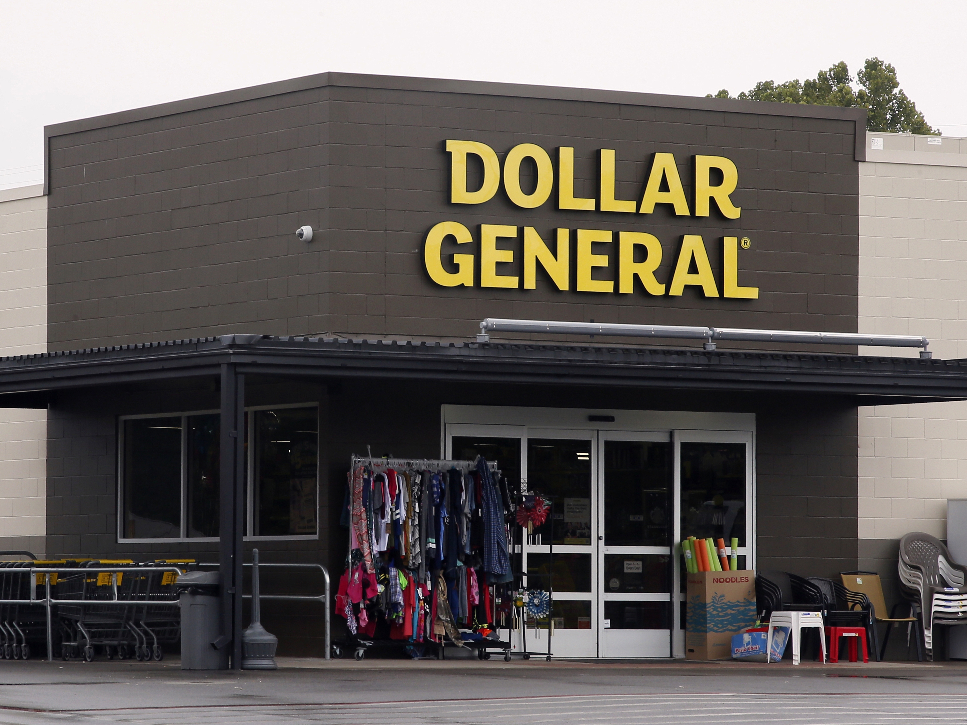 caption: Dollar General has agreed to pay a $12 million fine and improve conditions at its thousands of retail stores nationwide to make them safer for workers, the Labor Department said on Thursday. Here, a Dollar General store is seen on August 2017, in Luther, Okla.